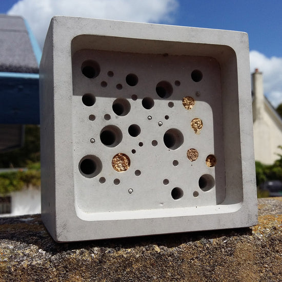 concrete bee house large bee block full of bees