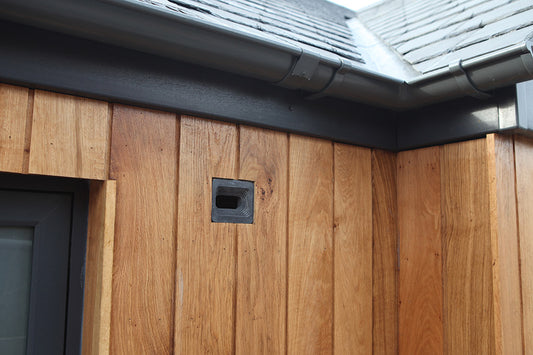swiftblock in wood panel wall