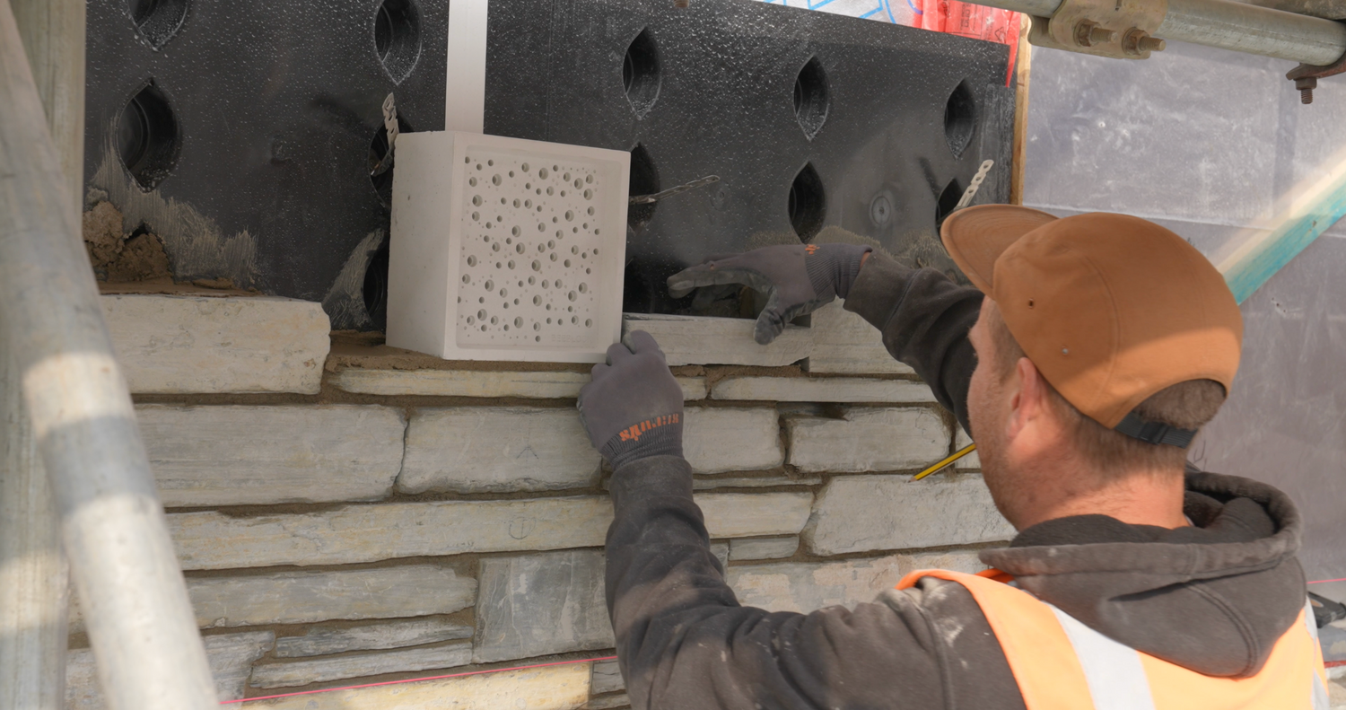Construction site implementing integrated habitats for nature with the bee brick