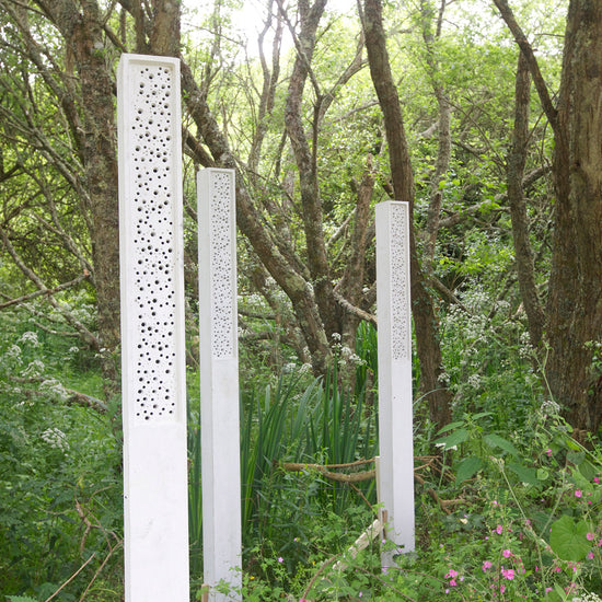 bee posts in wild landscape for solitary bees