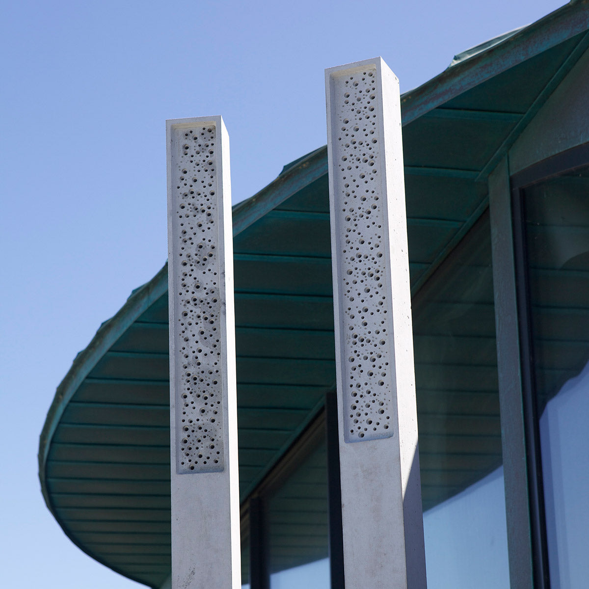 bee posts in stylish landscape