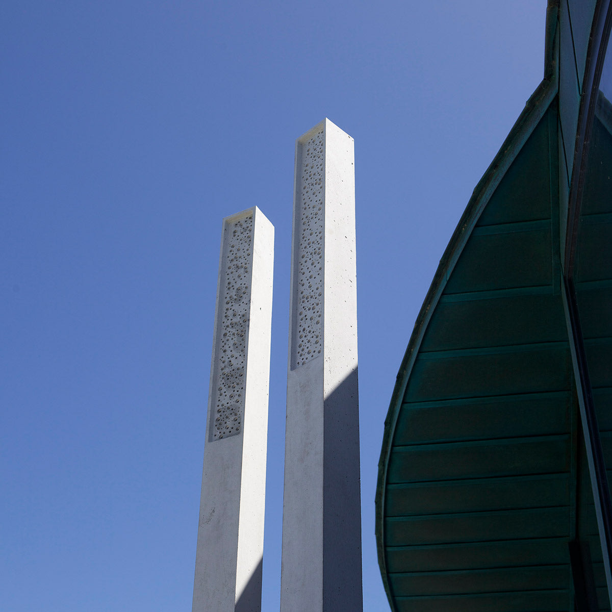 bee post bee towers in stylish landscape