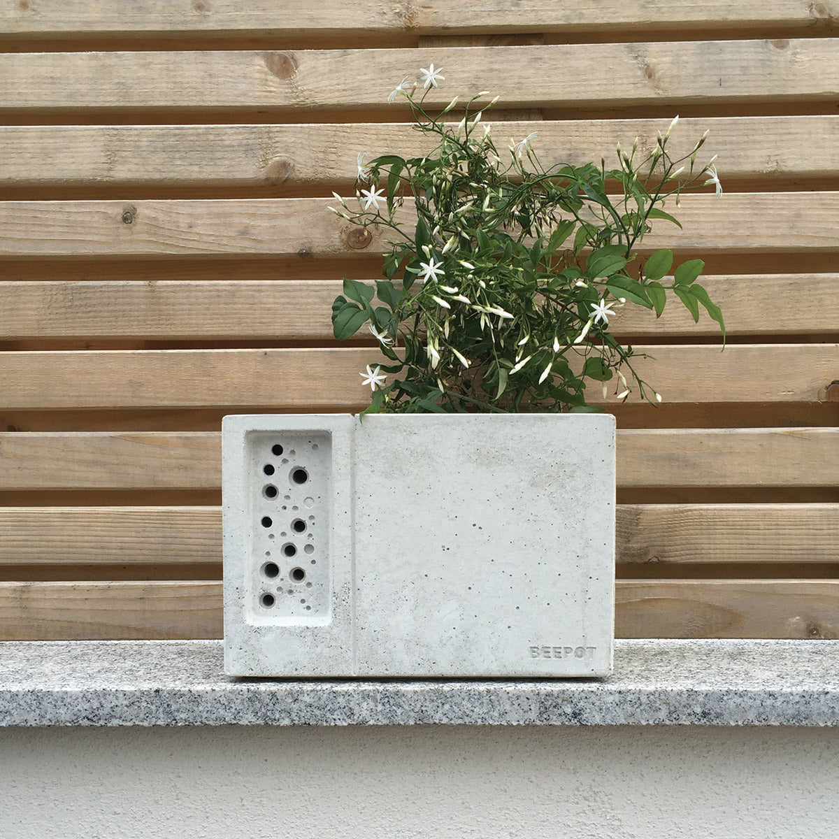 Beepot bee hotel and concrete planter