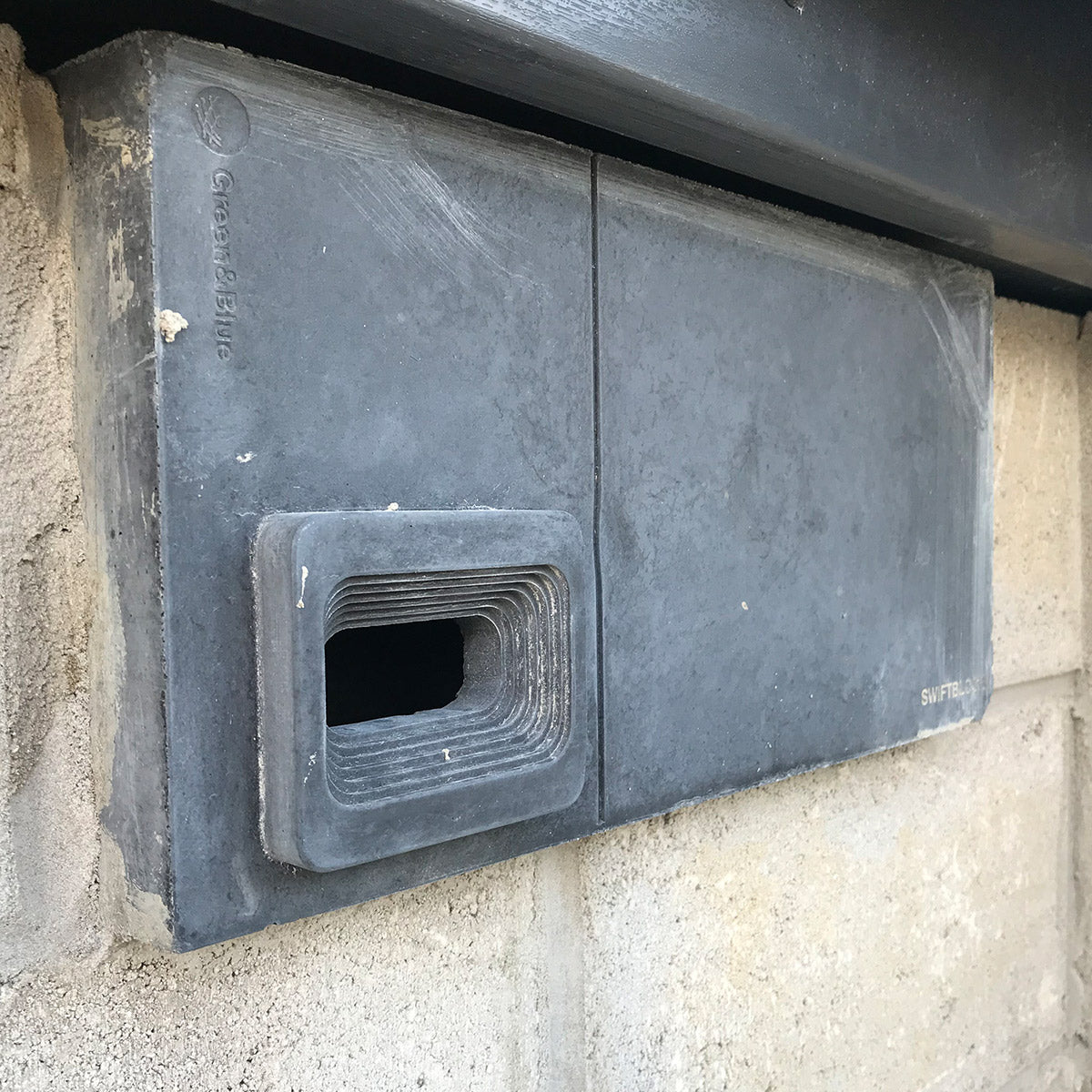 swift block swift box in charcoal installed in block wall
